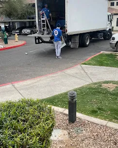Organized moving truck load with tie-down straps in Phoenix